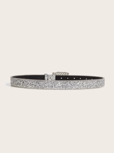 Close-up of shiny silver sequined belt with metallic square buckle and chain detail