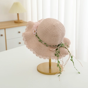 Pink woven straw sun hat for girls with lace brim and floral ribbon decoration