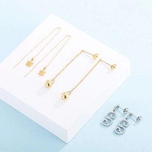 Détails de boucles d'oreilles tortue dorée, perle dorée et S argenté en acier inoxydable