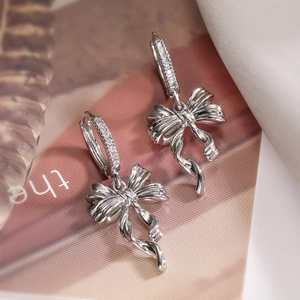 Elegant 18K silver plated bowknot earrings with sparkling cubic zirconia inlay for women