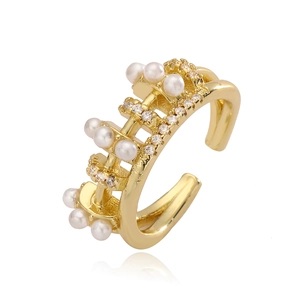 Elegant C-shaped gold-plated ear cuff featuring white pearls and zircon crystals