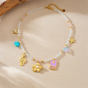 Retro clear beaded necklace with pink charms and golden music note sun pendants
