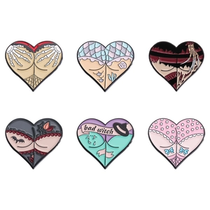 Halloween heart enamel pins set featuring skeleton hand, witch and bat designs