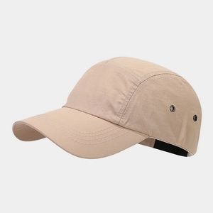 Detail of khaki 5-panel hat showing quick-dry fabric texture and metal eyelets