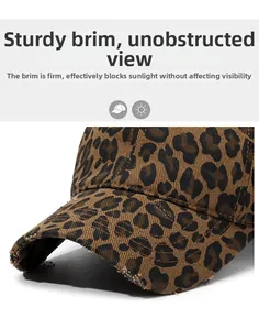 Close-up of leopard print baseball cap featuring distressed edges and a stiffened brim