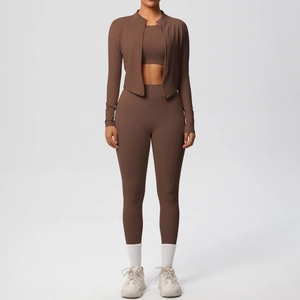 Three-piece coffee brown yoga set featuring a zip-up jacket, sports bra, and high-waist leggings