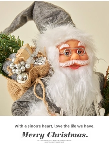 Detail of Santa Claus ornament with gray felt hat, glasses, and rustic gift sack