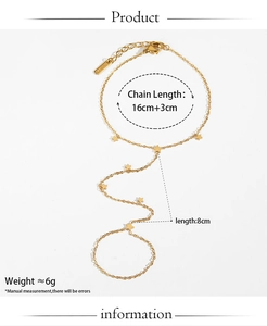 Detail of gold star finger chain bracelet showing lobster clasp and adjustable length