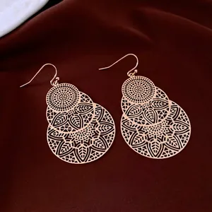 Hollow leaf floral earrings in rose gold finish with intricate Bohemian design