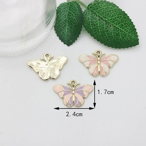 Pink and purple enamel butterfly charms in gold alloy with 1.7x2.4cm size markers