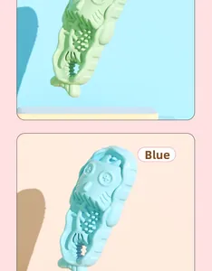 Detailed macro view of slipper-shaped TPR pet chew toys in light blue and green colors