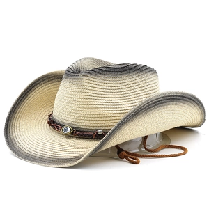 Western style hand-woven straw cowboy hat with evil eye ornament and adjustable chin strap