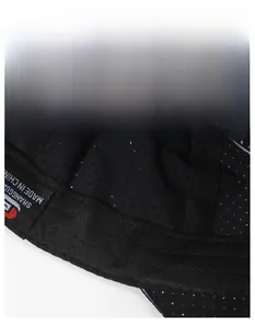 Detail of breathable mesh fabric and wide sweatband inside the black sports baseball cap