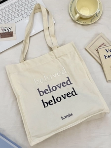 Minimalist cream canvas tote bag with beloved embroidery and wide shoulder straps