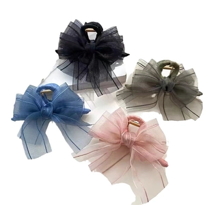Mesh bow hair claw clips for women in black, blue, pink, and grey-green set of four