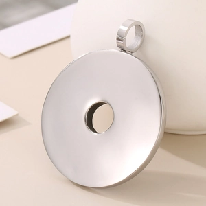 Polished stainless steel infinity circle pendant with a sleek metallic silver mirror finish