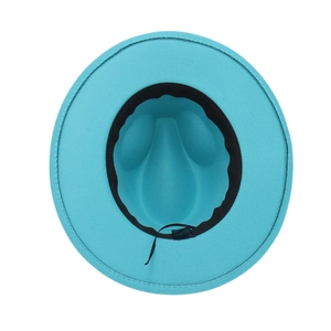 Macro view of blue wool felt jazz hat interior showing black sweatband and care label