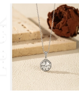 Macro detail of silver octagonal pendant necklace with crystal and sparkling rhinestones