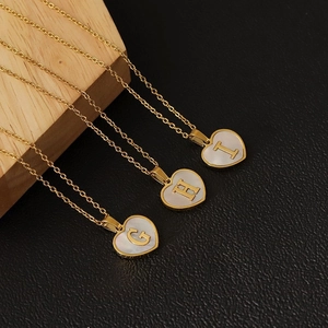 18k gold plated heart shell necklace featuring G, H, I initial letter pendants