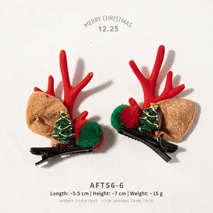 Christmas reindeer antler hair clips with plush ears and green mini holiday trees