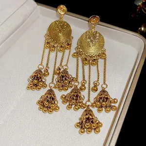 Vintage golden flower cluster earrings with bell tassels and sun relief engraving