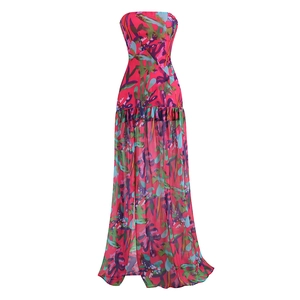 Detailed view of floral tube maxi dress with high waist cut and vibrant flowing fabric