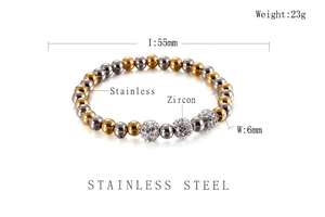 Detail view of 6mm stainless steel beaded bracelet featuring three cubic zircon spheres
