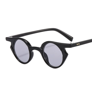 Retro small round frame hip-hop punk sunglasses with black frame and grey lenses in 45-degree angle