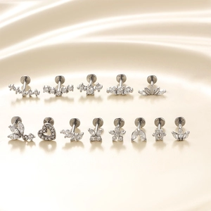Set of 13 silver stainless steel ear studs with heart, butterfly and flower zircon designs