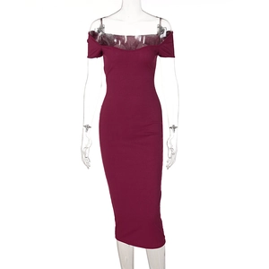 Detailed view of the burgundy off-shoulder ribbed knit dress on a mannequin