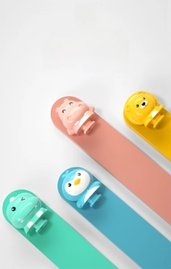Detailed view of colorful cartoon animal pop-up toy for infant sensory and color learning