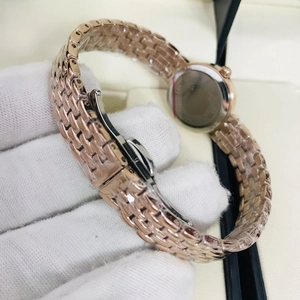 Elegant ultra-thin rose gold women's watch with stainless steel multi-link strap and butterfly clasp