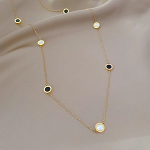 Minimalist titanium steel gold necklace with double-sided black and white Roman charms