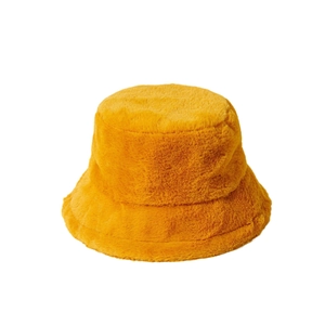 Bright yellow plush bucket hat for women with warm faux fur and cozy winter design