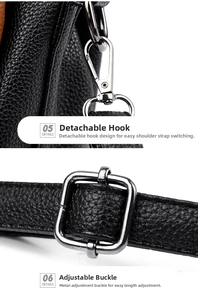 Detail of silver hardware hooks and adjustable buckle on black lychee texture tote bag