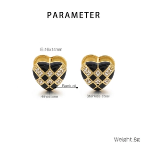 Detail view of heart-shaped checkerboard earrings with rhinestones and dimensions