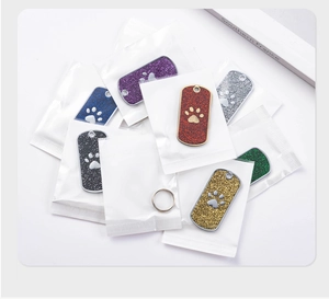 Assorted glitter zinc alloy dog tags with paw prints in diverse vibrant colors