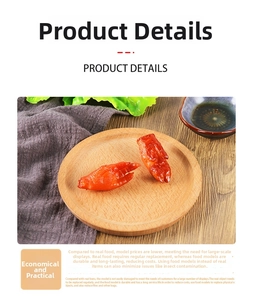 Detailed close-up of a realistic braised chicken feet food model on a wooden tray