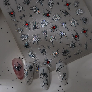 3D gothic nail stickers featuring dark spider webs, roses, and red rhinestones for nail art