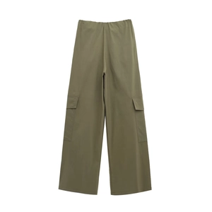 Detail of army green wide-leg cargo pants featuring large utility side pockets