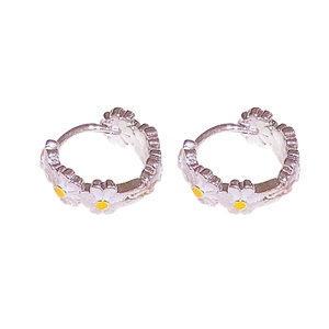 Vintage enamel daisy hoop earrings in silver and white for a classic floral jewelry style