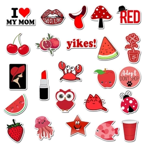 Detail shot of cute red-themed waterproof stickers featuring cherry and cat graffiti designs