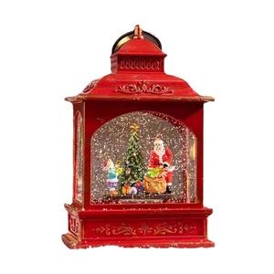 Red Christmas train lantern with Santa, snow globe effect and festive LED lighting