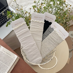 Five pack of women's mesh cotton crew socks with ruffled cuffs in neutral colors