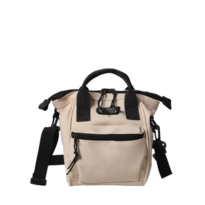 Sac bandoulière minimaliste en toile beige avec anses noires et logo SPORT sur fond blanc