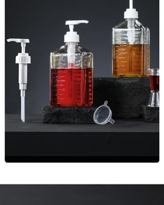 Clear glass syrup dispenser bottle set with white pump head and 1000ml scale marking