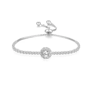 Adjustable silver tone bracelet with sparkling zircon halo centerpiece and sliding drawstring
