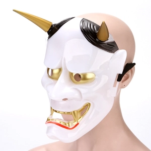 Japanese Hannya mask in white and gold resin shown from a 45-degree side angle