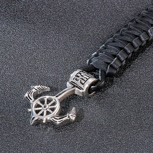 Bracelet homme en cuir tressé noir avec fermoir ancre et gouvernail en argent
