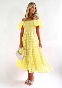 Full view of off-shoulder yellow plaid dress with tiered skirt and puff sleeves
